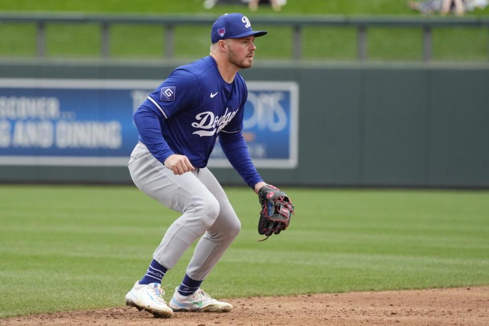 Dodgers shortstop Gavin Lux watches a pitch during a spring training game