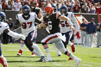 Cleveland Browns quarterback Baker Mayfield (6) scores a 5-yard touchdown during the first half of an NFL football game against the Houston Texans, Sunday, Sept. 19, 2021, in Cleveland. (AP Photo/Ron Schwane)