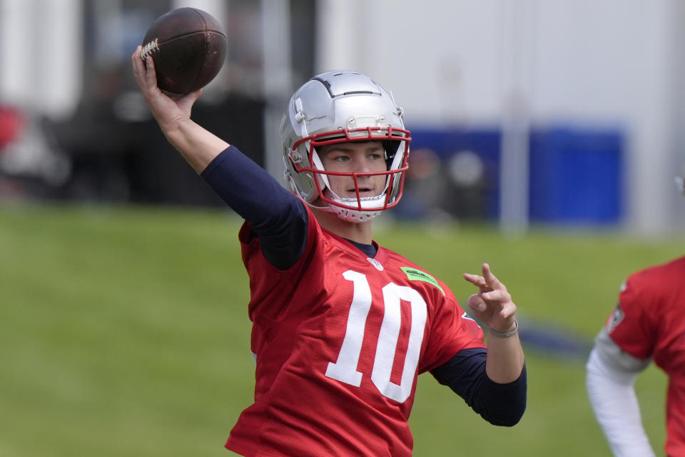 New England Patriots quarterback Drake Maye winds up to pass the the ball during an NFL football offseason workout, Monday, May 20, 2024, in Foxborough, Mass. (AP Photo/Steven Senne)