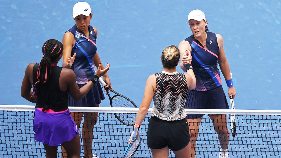 Sam Stosur and Zhang Shuai, pictured here shaking hands with Coco Gauff and Catherine McNally.