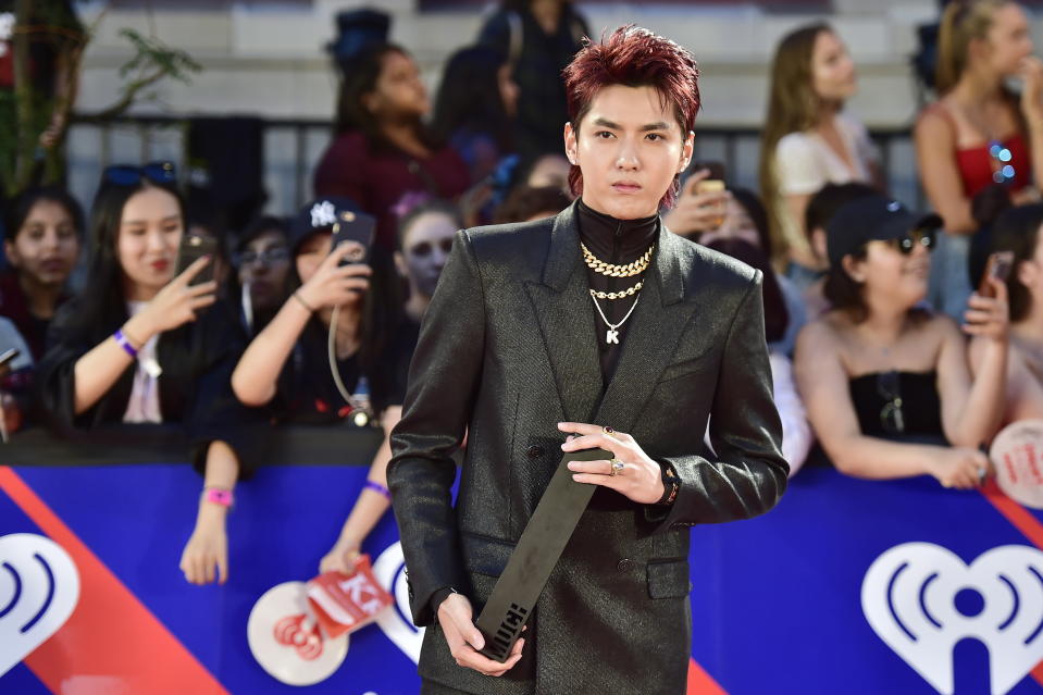 FILE - Singer Kris Wu celebrates his award for Fan Fave New Artist on the red carpet at the iHeartRadio MMVAs in Toronto on Aug. 26, 2018. A Beijing court on Friday, Nov. 25, 2022 sentenced Chinese-Canadian pop star Kris Wu to 13 years in prison on charges including rape. (Frank Gunn/The Canadian Press via AP, File)