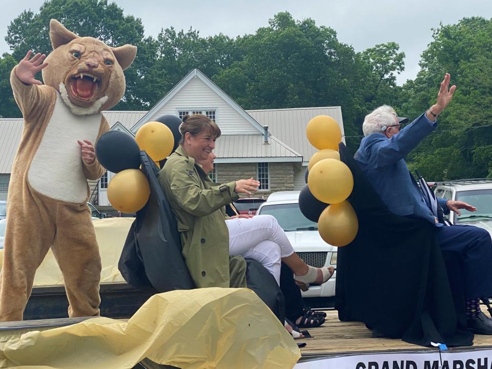 Maury County Schools Superintendent Lisa Ventura rides the Wildcat Float with the Santa Fe Wildcat mascot and grand marshals of the parade to celebrate 100 years of Santa Fe Unit School on May 20. To the right of Ventura is former principal Kenneth Jackson.