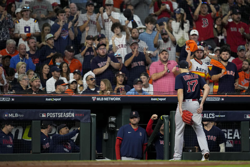 Boston Red Sox starting pitcher Nathan Eovaldi leaves the game against the Houston Astros during the sixth inning in Game 2 of baseball's American League Championship Series Saturday, Oct. 16, 2021, in Houston. (AP Photo/David J. Phillip)