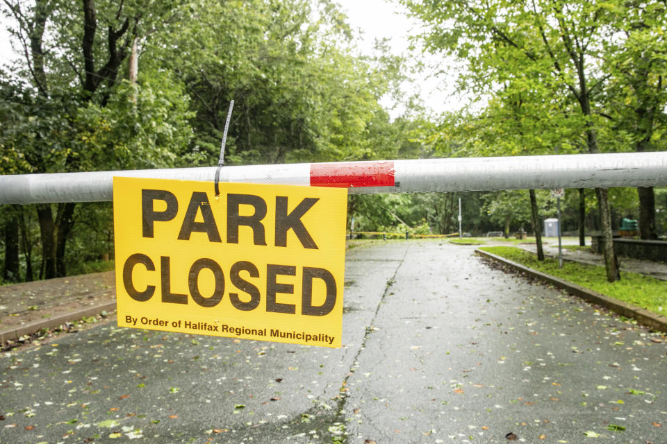 Point Pleasant Park is closed in Halifax, Nova Scotia, on Saturday, Sept. 16, 2023. Severe conditions were predicted across parts of Massachusetts and Maine, and hurricane conditions could hit the Canadian provinces of New Brunswick and Nova Scotia, where the storm, Lee, downgraded early Saturday from hurricane to post-tropical cyclone, was expected to make landfall later in the day. (Kelly Clark /The Canadian Press via AP)