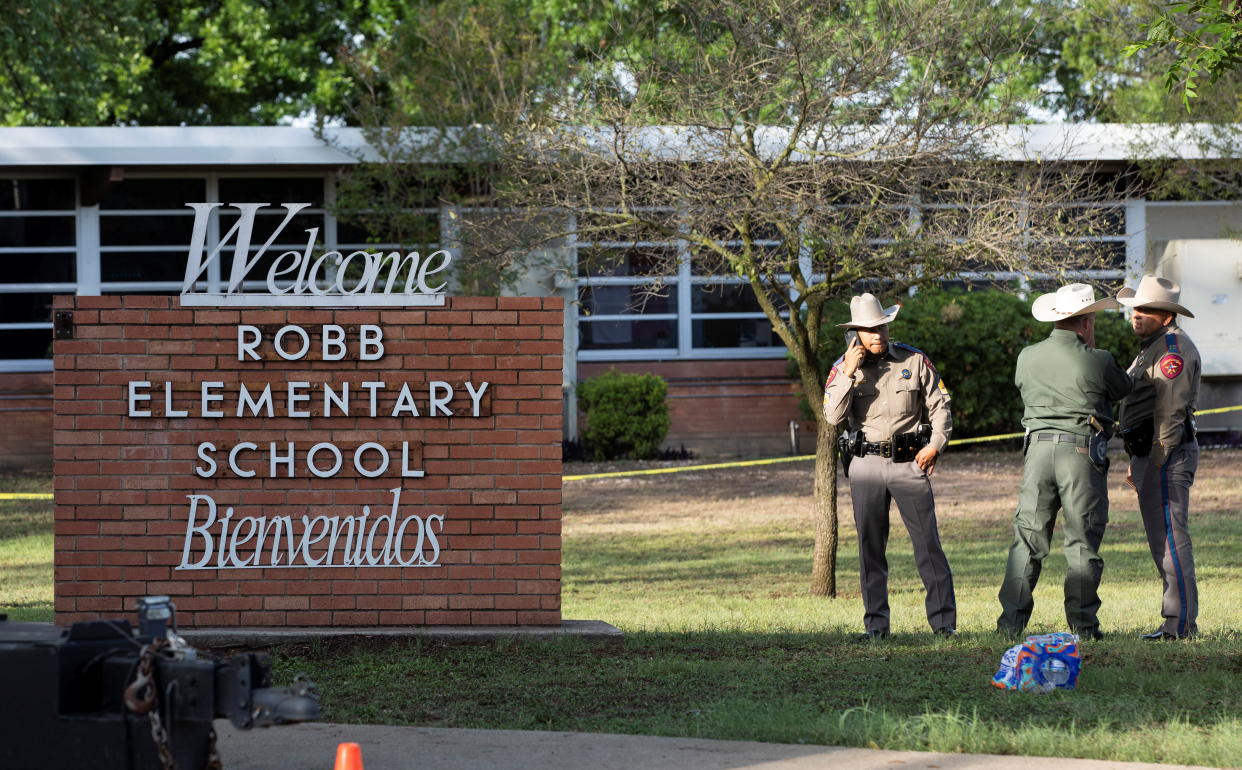 Law enforcement personnel work at the scene of a mass shooting in Robb Elementary School, in Uvalde, Texas, U.S., May 25, 2022.  REUTERS/Nuri Vallbona