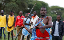 Tipape Lekatoo, a Maasai Moran from Mbirikani Manyatta, throws a javelin as he competes in the 2018 Maasai Olympics at the Sidai Oleng Wildlife Sanctuary, at the base of Mt. Kilimanjaro, near the Kenya-Tanzania border in Kimana, Kajiado, Kenya December 15, 2018. REUTERS/Thomas Mukoya