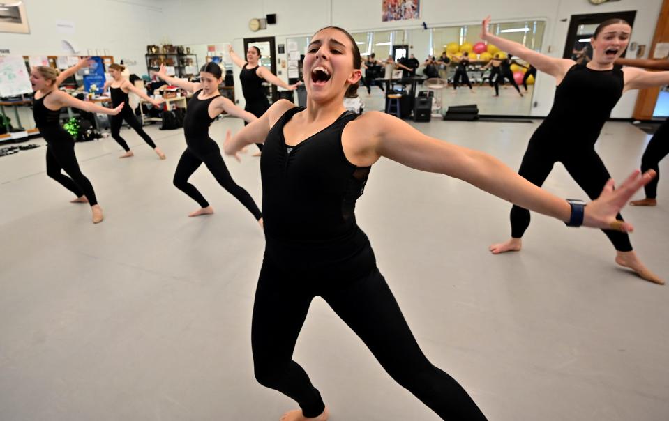 Co-captain Katie Chacharone and the Burncoat High School Dance Team practice Wednesday in Worcester. The team is traveling to Orlando, Fla., for nationals with hopes of being awarded first place.