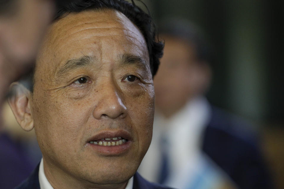 Qu Dongyu from China, one of the candidates for the Director-General position of the FAO (UN Food and Agriculture Organization), arrives to address a plenary meeting of the 41st Session of the Conference, at the FAO headquarters in Rome, Saturday, June 22, 2019. The new FAO Director-General will be voted on Sunday. (AP Photo/Andrew Medichini)