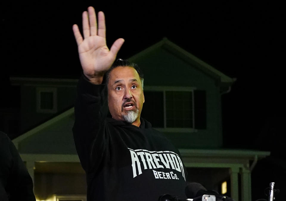 Richard Fierro gestures while speaking during a news conference outside his home about his efforts to subdue the gunman in Saturday's shooting at Club Q, Monday, Nov. 21, 2022, in Colorado Springs, Colo. (AP Photo/Jack Dempsey)