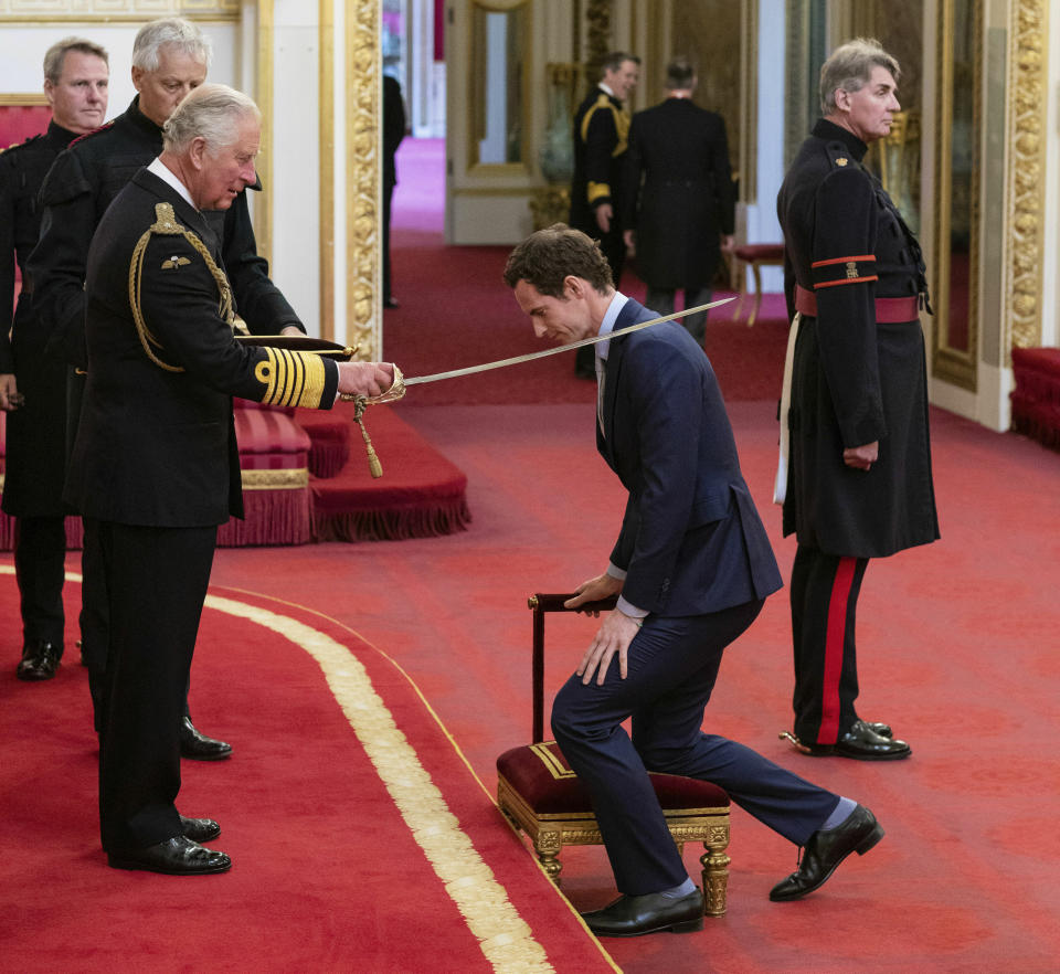 Britain's Andy Murray receives his knighthood from Prince Charles during an investiture ceremony at Buckingham Palace, London, Thursday May 16, 2019. (Dominic Lipinski/PA via AP)