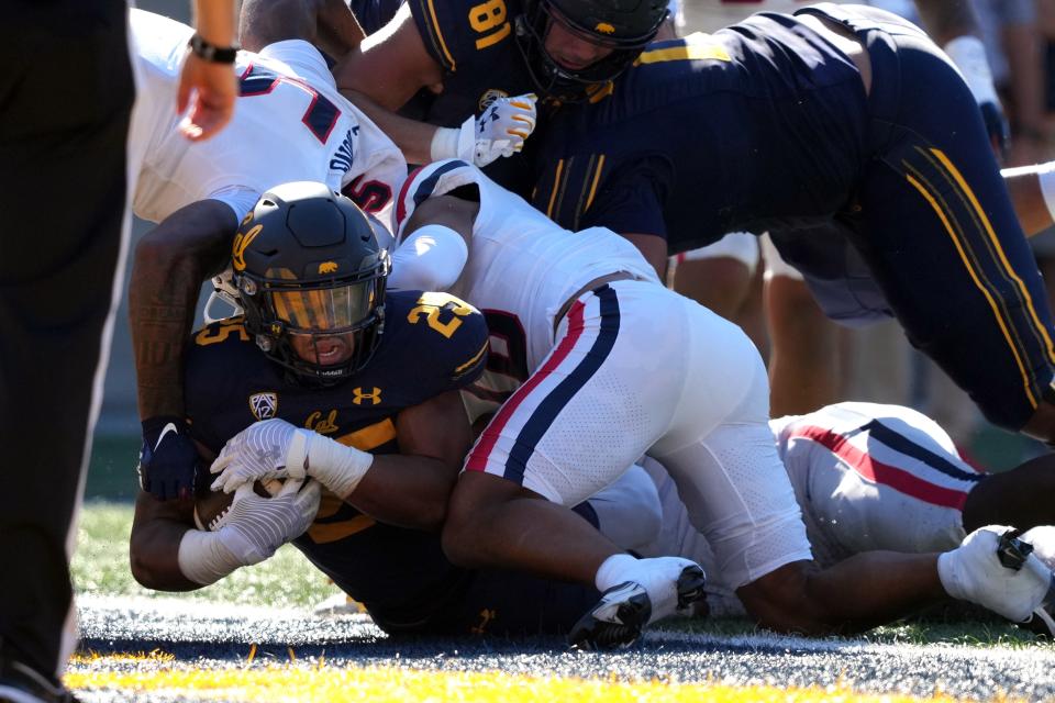 Sep 24, 2022; Berkeley, California, USA; California Golden Bears running back DeCarlos Brooks (25) scores a touchdown against the Arizona Wildcats during the second quarter at FTX Field at California Memorial Stadium.