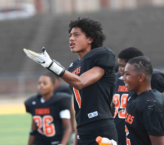 Adam Jones salutes Chris Henry with helmet