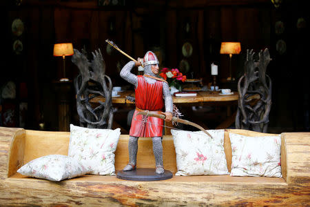 A wooden model is pictured outside of "Robin Hood's hut" at the British curiosities collection "Little Britain" of Gary Blackburn, a 53-year-old tree surgeon from Lincolnshire, Britain, in Linz-Kretzhaus, south of Germany's former capital Bonn, Germany, August 24, 2017. REUTERS/Wolfgang Rattay