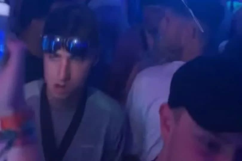 A still image from a video of Jay at the rave