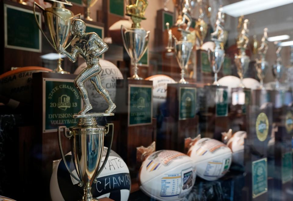 The Marion Local football program has won a record 13 state championships. The spoils of the Flyers' winning ways in all sports are displayed in trophy cases throughout the school's halls.