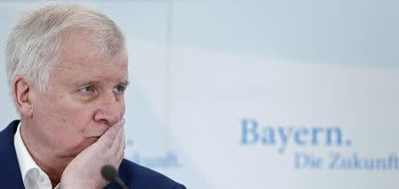 Bavarian state premier and leader of the Christian Social Union (CSU) Horst Seehofer attends a news conference in Sankt Quirin, Germany, July 26, 2016. REUTERS/Michaela Rehle/Files