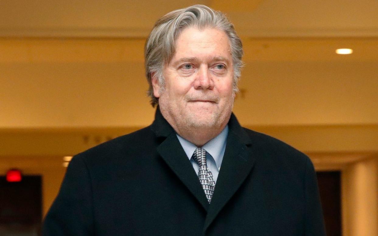 Former White House strategist Steve Bannon leaves a House Intelligence Committee meeting - AP