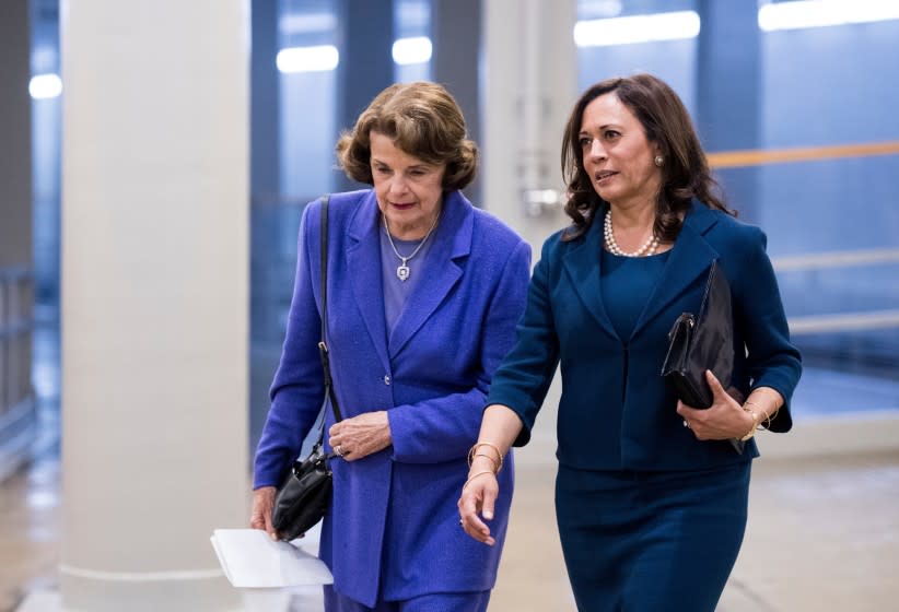 California's U.S. Sens. <span class="caas-xray-inline-tooltip"><span class="caas-xray-inline caas-xray-entity caas-xray-pill rapid-nonanchor-lt" data-entity-id="Dianne_Feinstein" data-ylk="cid:Dianne_Feinstein;pos:1;elmt:wiki;sec:pill-inline-entity;elm:pill-inline-text;itc:1;cat:Politician;" tabindex="0" aria-haspopup="dialog"><a href="https://search.yahoo.com/search?p=Dianne%20Feinstein" data-i13n="cid:Dianne_Feinstein;pos:1;elmt:wiki;sec:pill-inline-entity;elm:pill-inline-text;itc:1;cat:Politician;" tabindex="-1" data-ylk="slk:Dianne Feinstein;cid:Dianne_Feinstein;pos:1;elmt:wiki;sec:pill-inline-entity;elm:pill-inline-text;itc:1;cat:Politician;" class="link ">Dianne Feinstein</a></span></span>, left, and Kamala Harris, now the vice president-elect, at the Capitol in September 2017. <span class="copyright">(Bill Clark / CQ Roll Call)</span>