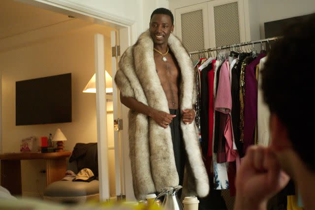 <p>HBO</p> Jerrod Carmichael tries on Emmy outfits on 'The Jerrod Carmichael Reality Show'