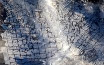 Rice fields in Japan covered in snow were captured in one of Hadfield's photos. Hadfield Tweeted the image with, 'Japanese rice fields tidily blanketed with snow. '