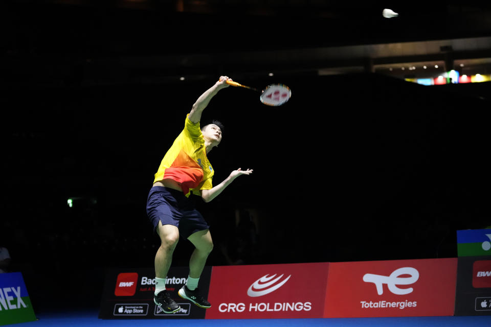 Thailand's Kunlavut Vitidsarn plays a shot against Denmark's Viktor Axelsen during their men's singles badminton final match at the BWF World Championships in Tokyo, Japan, Sunday, Aug. 28, 2022. (AP Photo/Shuji Kajiyama)