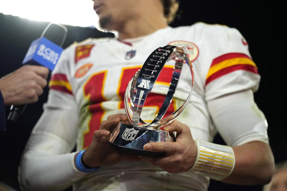 Kansas City Chiefs quarterback Patrick Mahomes (15) holds the Lamar Hunt Trophy after the AFC Championship NFL football game against the Baltimore Ravens, Sunday, Jan. 28, 2024, in Baltimore. The Chiefs won 17-10. (AP Photo/Matt Slocum)