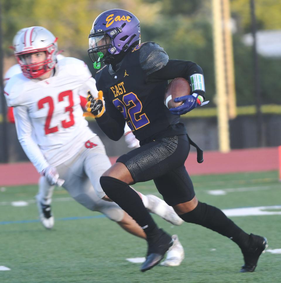 Anthony Ramon Diaz of East takes the opening kickoff for a touchdown to give the Eagles an early lead over Canandaigua.