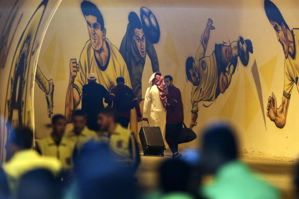 In this photo provided by Iranian Students' News Agency, ISNA, members of Saudi Arabia's Al Ittihad soccer team leave Naghsh-e-Jahan stadium in the central city of Isfahan, Iran, Monday, Oct. 2, 2023. Al Ittihad refused to play a match in Iran on Monday because of the presence of a statue of a slain Iranian general Qassem Soleimani placed on the sideline, Saudi state media reported. (Behrouz Naderi, ISNA via AP)