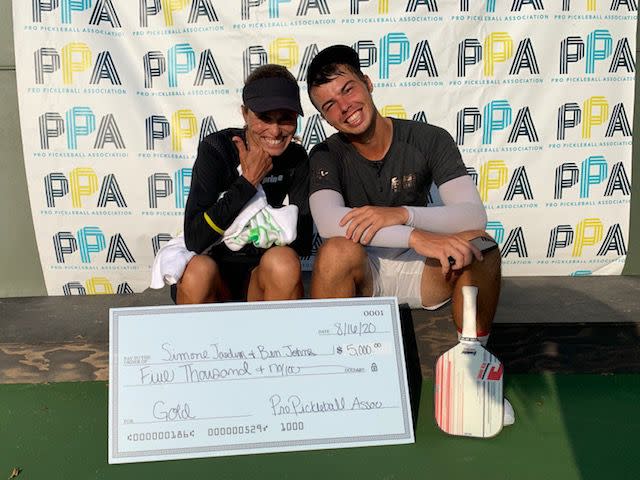 Ben Johns with his mixed doubles partner, Simone Jardim, after winning gold together.