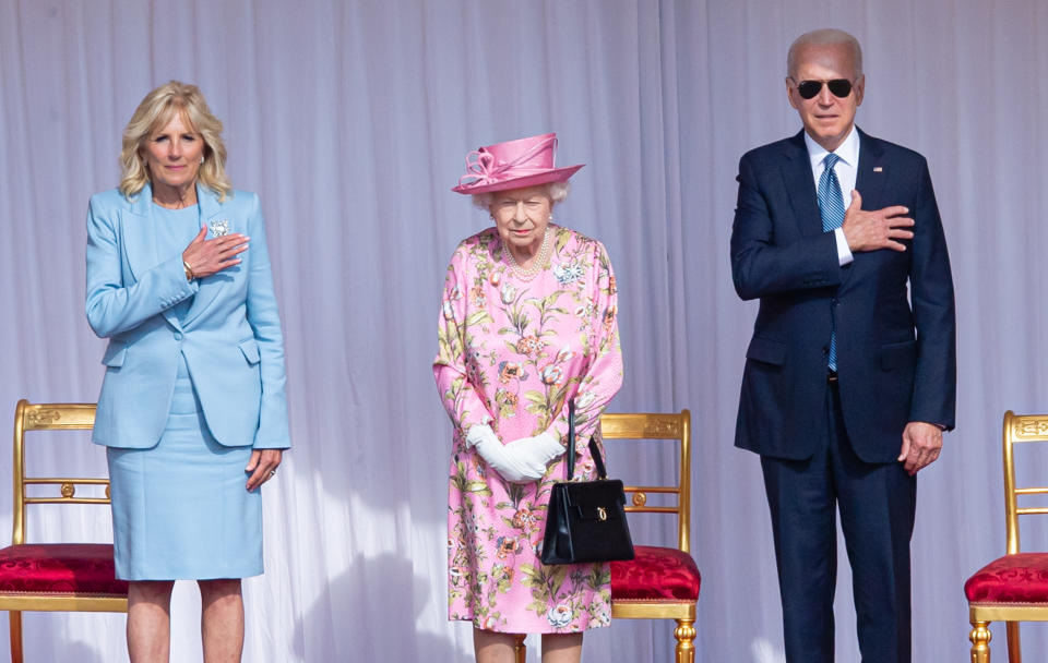 WINDSOR, ENGLAND - JUNE 13: Queen Elizabeth II (C), US President Joe Biden (R) and US First Lady Dr Jill Biden (L) at Windsor Castle on June 13, 2021 in Windsor, England. Queen Elizabeth II hosts US President, Joe Biden and First Lady Dr Jill Biden at Windsor Castle. The President arrived from Cornwall where he attended the G7 Leader's Summit and will travel on to Brussels for a meeting of NATO Allies and later in the week he will meet President of Russia, Vladimir Putin.  (Photo by Samir Hussein - Pool/WireImage )