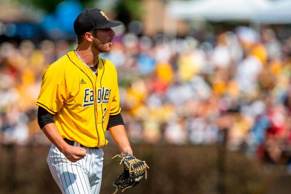 Southern Miss starting pitcher Tanner Hall cheers after an inning during the Super Regionals Final at Pete Taylor Park in Hattiesburg on Sunday, June 12, 2022.