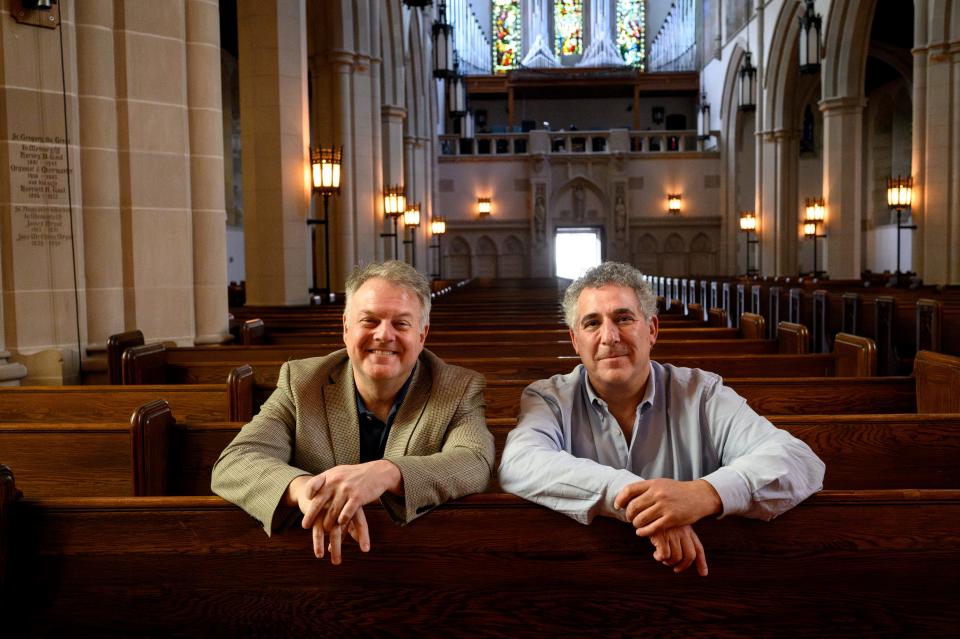 The Rev. Jonathon Jensen, left, sits with Rabbi Aaron Bisno, who is rabbi-in-residence at Jensen's church, Calvary Episcopal, on Thursday, Oct. 26, 2023, in Pittsburgh's Shadyside neighborhood.