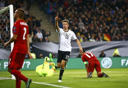 Football Soccer - Germany v Czech Republic - 2018 World Cup Qualifying European Zone - Group C - Hamburg arena, Hamburg, Germany - 8/10/16 Germany's Thomas Mueller reacts after scoring REUTERS/Wolfgang Rattay