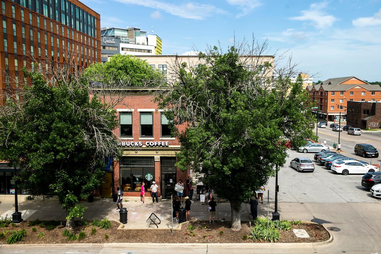 Starbucks employees strike, Friday, June 30, 2023, outside the 228 S Clinton St. location in Iowa City, Iowa. The employees voted 25-0 in favor of unionizing out of 30 people eligible in the election on May 11.