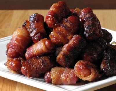 <strong>Get the <a href="http://cookingventures.blogspot.com/2009/09/bacon-wrapped-lil-smokies.html">Bacon-Wrapped Li'l Smokies recipe</a> by Cooking Ventures</strong>