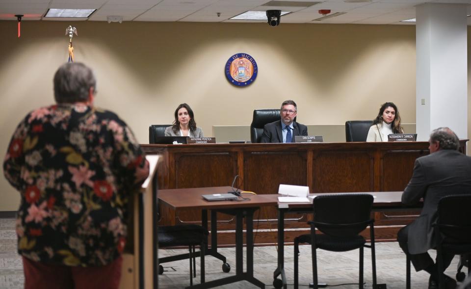 Diane Wohlscheid, of Eagle Township, addresses the Michigan Public Service Commission, Thursday, Nov. 13, 2023, during a MPSC meeting in Lansing.