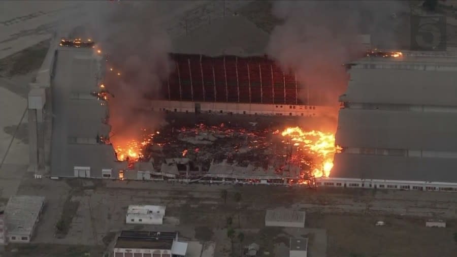 Historic hangar at former air base engulfed in flames.