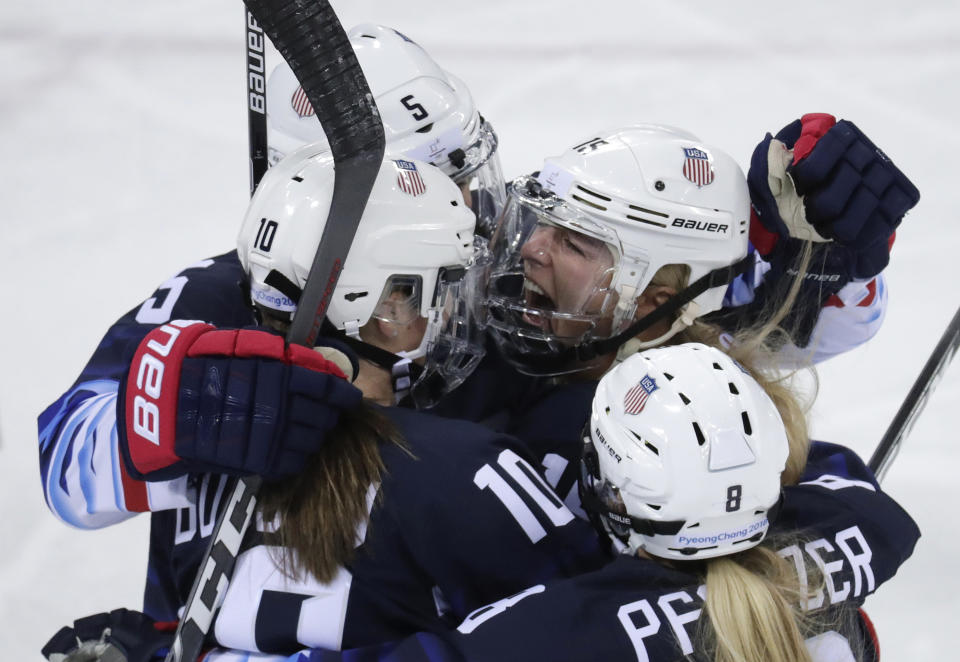 <p>Gigi Marvin (19), of the United States, celebrates with her teammates after scoring a goal against Finland during the first period of the semifinal round of the women’s hockey game at the 2018 Winter Olympics in Gangneung, South Korea, Monday, Feb. 19, 2018. (AP Photo/Julio Cortez) </p>