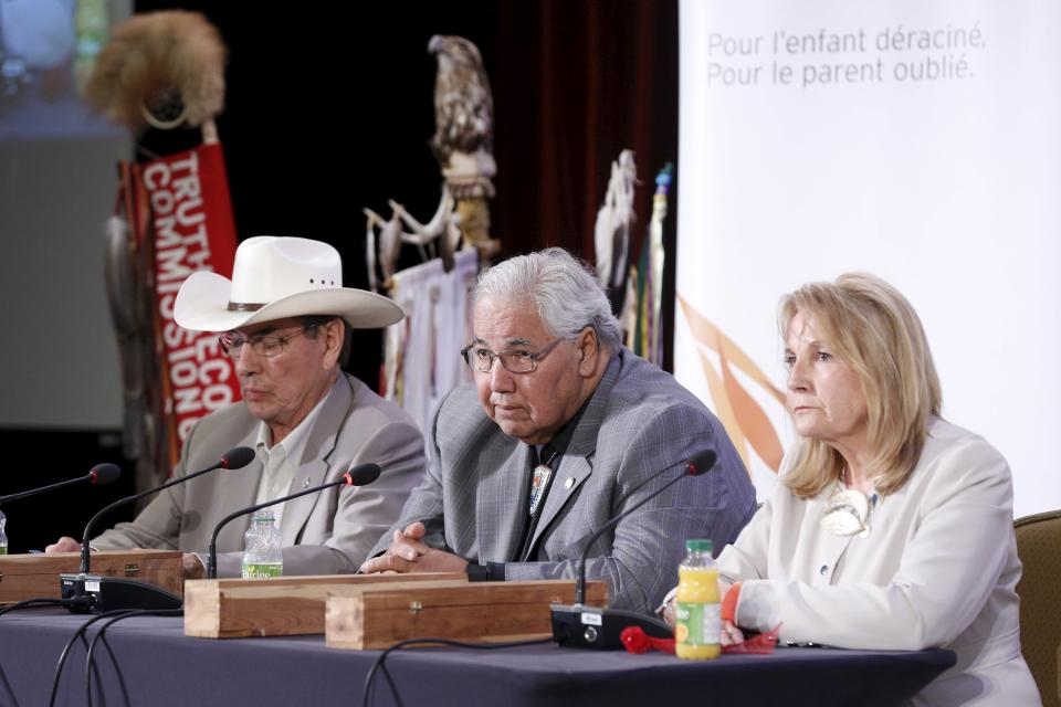 Commissioners Dr. Marie Wilson (R), Justice Murray Sinclair, and Chief Wilton Littlechild take part in a press conference at a Truth and Reconciliation Commission of Canada event in Ottawa June 2, 2015. The Truth and Reconciliation Commission of Canada presented its final report on the Indian Residential Schools. REUTERS/Blair Gable