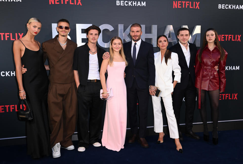 LONDON, ENGLAND - OCTOBER 03: (L-R) Mia Regan, Romeo Beckham, Cruz Beckham, Harper Beckham, David Beckham, Victoria Beckham, Brooklyn Beckham and Nicola Peltz attend the Netflix 'Beckham' UK Premiere at The Curzon Mayfair on October 03, 2023 in London, England. (Photo by Karwai Tang/WireImage)