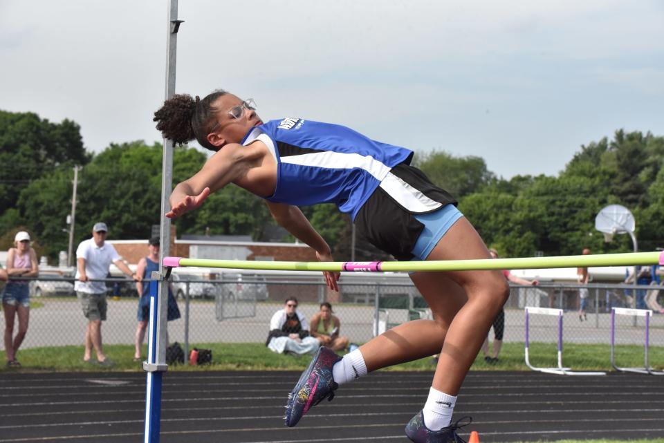 Adrian's Akkya Campbell competes in the high jump at the Lenawee County Track and Field Championships at Onsted.