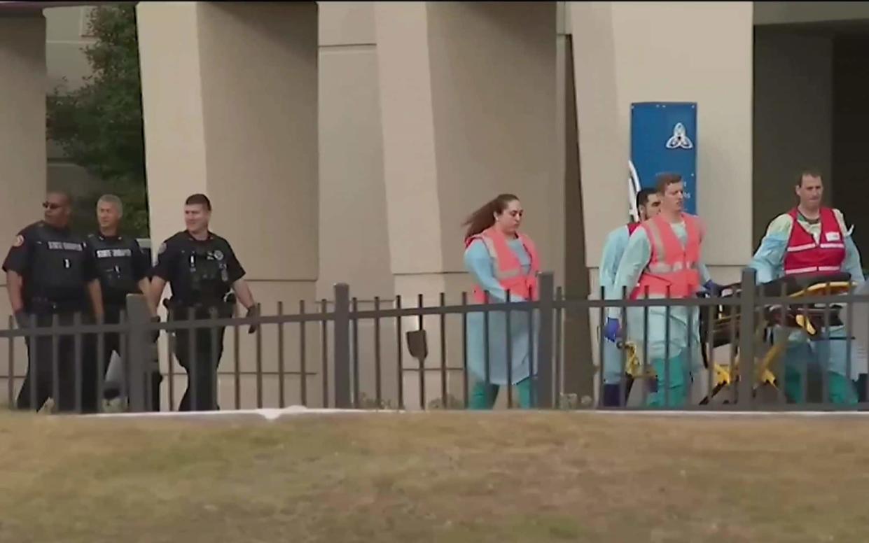 Emergency responders near the Naval Air Base Station in Pensacola - WEAR-TV