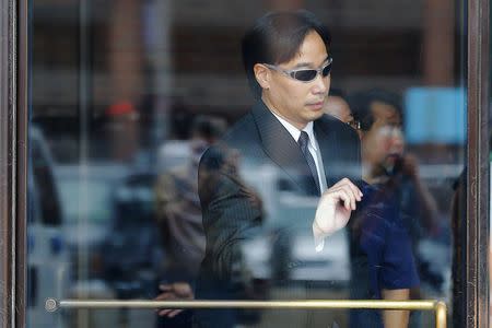 Glenn Adam Chin leaves the federal courthouse in Boston, Massachusetts September 11, 2014 following his arraignment on a mail fraud charge. REUTERS/Brian Snyder