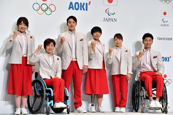 Paralympians and Olympians from the Japan team pose in their delegation uniforms for Tokyo 2020 (The Asahi Shimbun via Getty Imag)