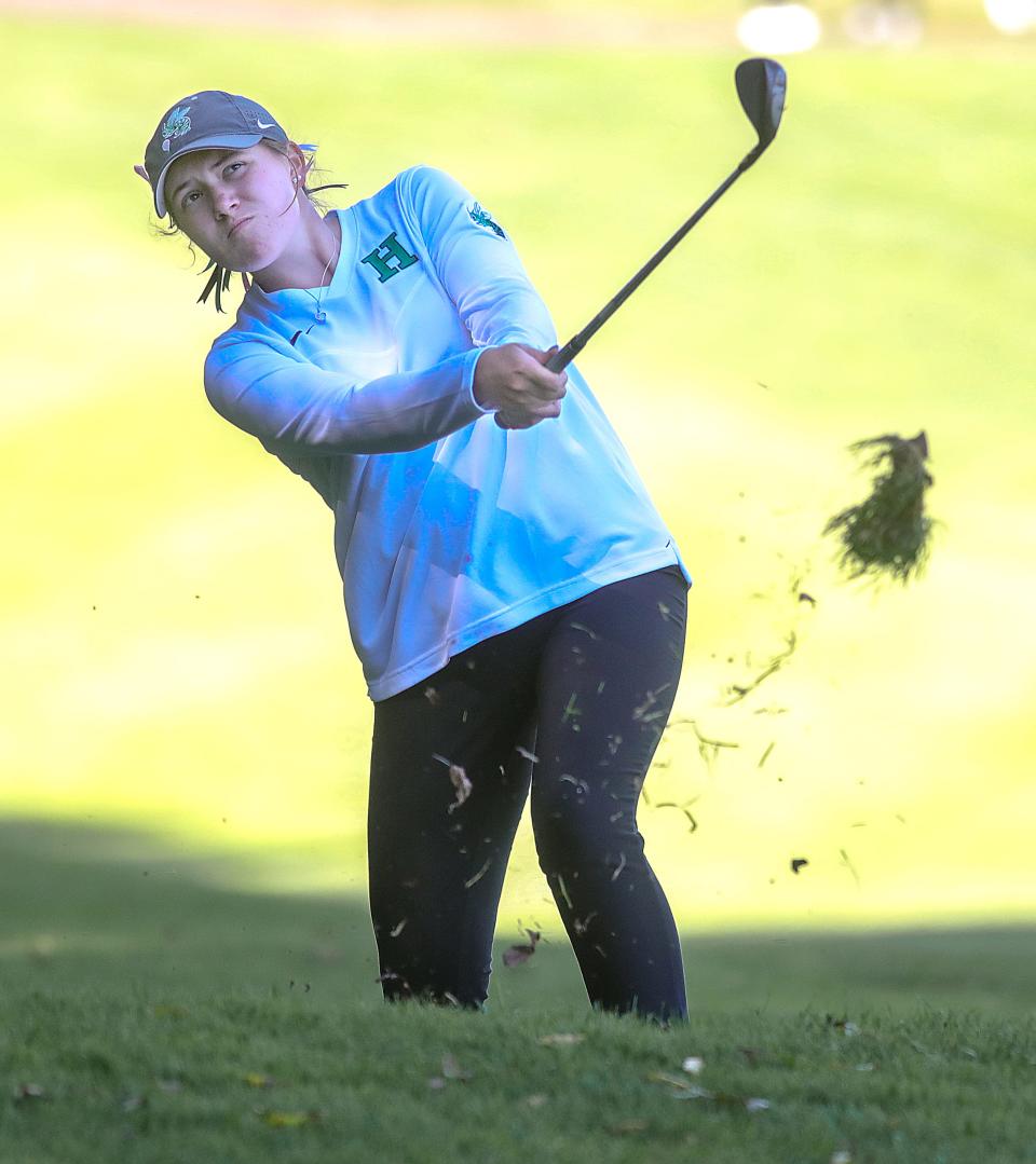 Highland's Isabella Goyette hits out of the rough on No. 7 during the Division I district tournament on Oct. 11 at Brookledge Golf Club in Cuyahoga Falls.