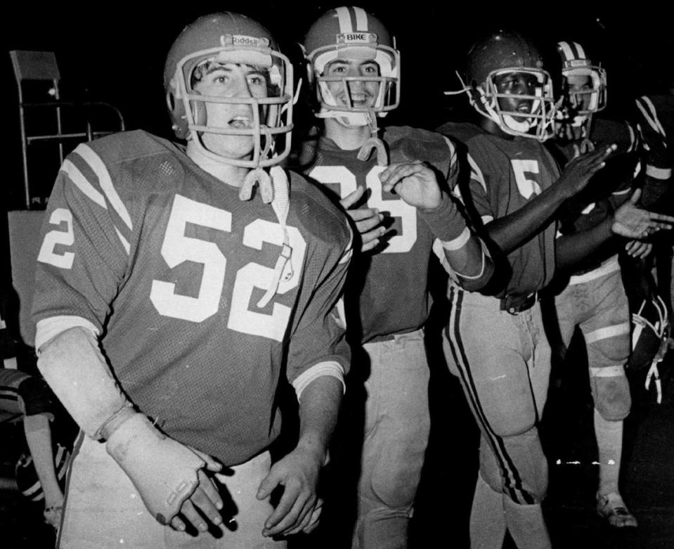 Members of the Miami Beach High football team in 1979: Larry Baker, left.