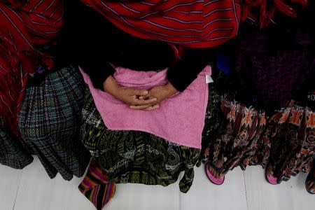 Indigenous women of the Mayan ethnic Q'eqchi group sit with their faces covered during the final hearing for the Sepur Zarco case in Guatemala City, Guatemala, February 26, 2016. Guatemalan Army Colonel Esteelmer Reyes Giron and ex-military commissioner Heriberto Valdez are accused of committing crimes against humanity, as well as sexual violence and slavery against fifteen indigenous women of the Mayan ethnic Q'eqchi group, between 1982 to 1986 at the military base of Sepur Zarco, during Guatemala's bloody 36-year civil war, local media reported. REUTERS/Josue Decavele - RTS87GH