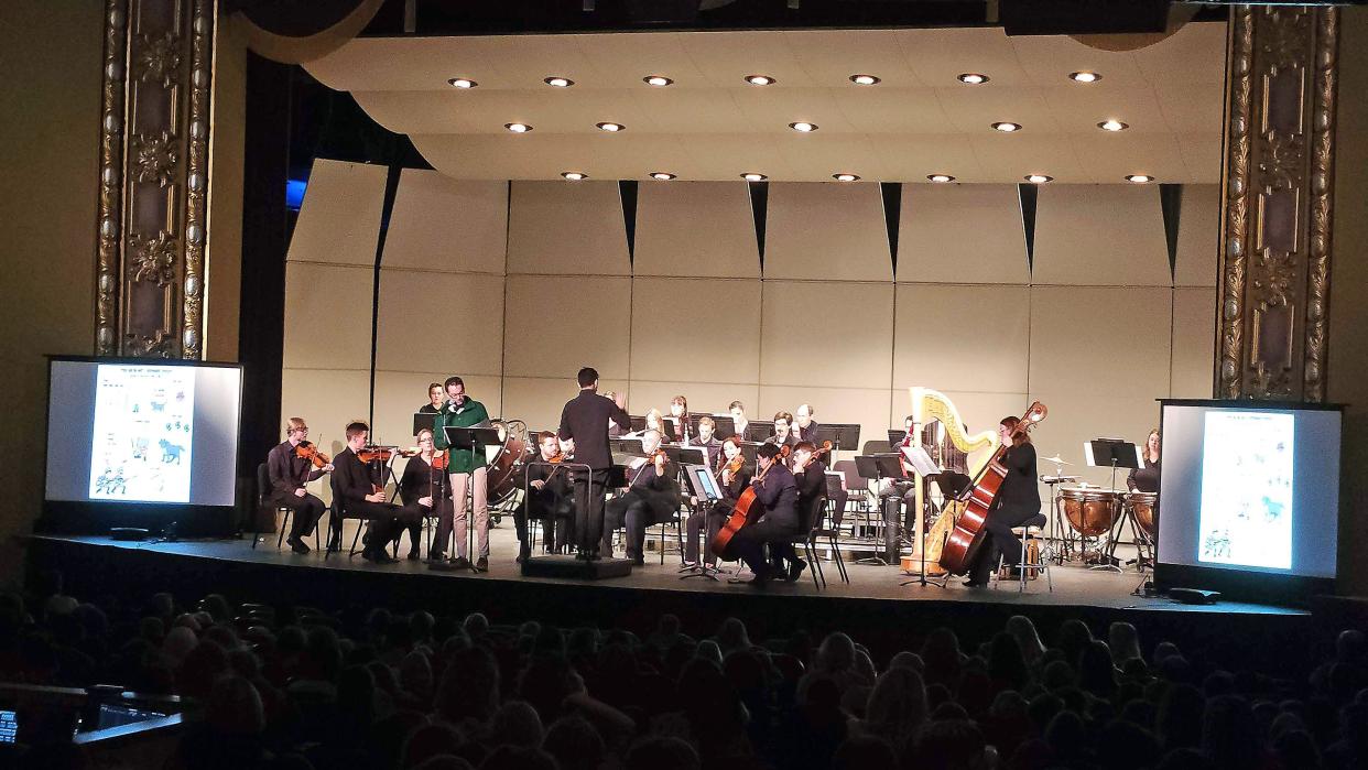 The Missouri Symphony, with Executive Director Trent Rash portraying Mr. Mosy and under the direction of Wilbur Lin, perform 'Peter and the Wolf' by Sergei Prokofiev on Thursday morning for Columbia third graders.