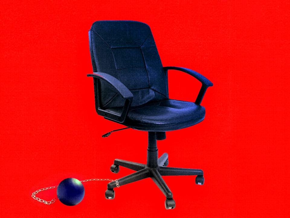 Photo illustration of an office chair with ball and chain.