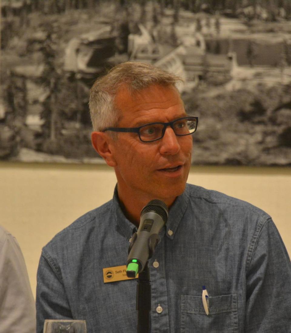 Bellingham Mayor Seth Fleetwood talks with other candidates for mayor at a forum hosted by the Bellingham Chamber of Commerce and the Downtown Bellingham Partnership at the Whatcom Museum’s Old City Hall galleries on Tuesday.